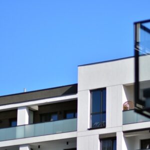 modern building exterior with black railing